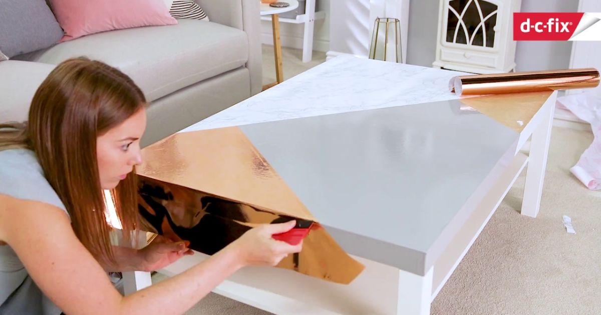 Applying Adhesive to the Coffee Table